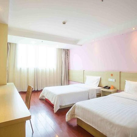 7Days Inn Guangzhou Gangding Longkou XI Road Quarto foto