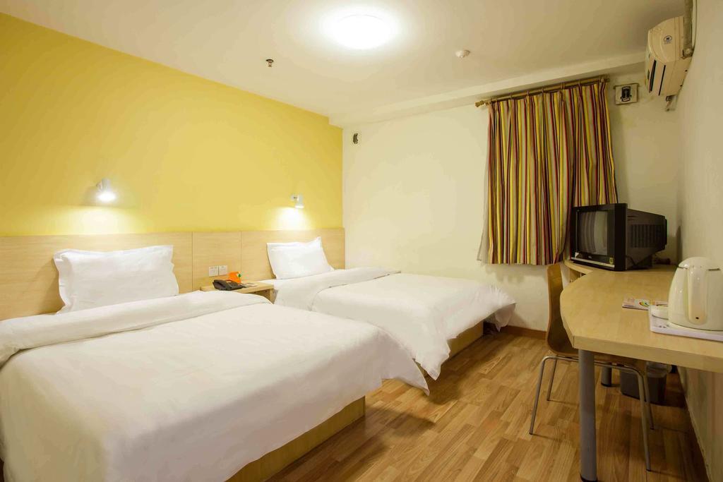 7Days Inn Guangzhou Gangding Longkou XI Road Quarto foto