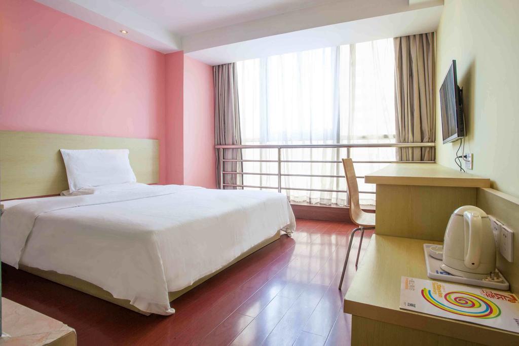 7Days Inn Guangzhou Gangding Longkou XI Road Quarto foto