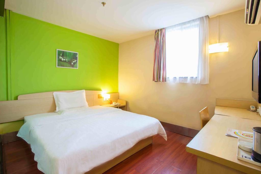 7Days Inn Guangzhou Gangding Longkou XI Road Quarto foto