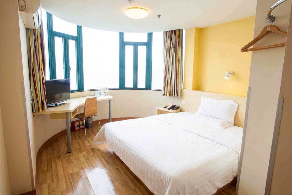7Days Inn Guangzhou Gangding Longkou XI Road Quarto foto