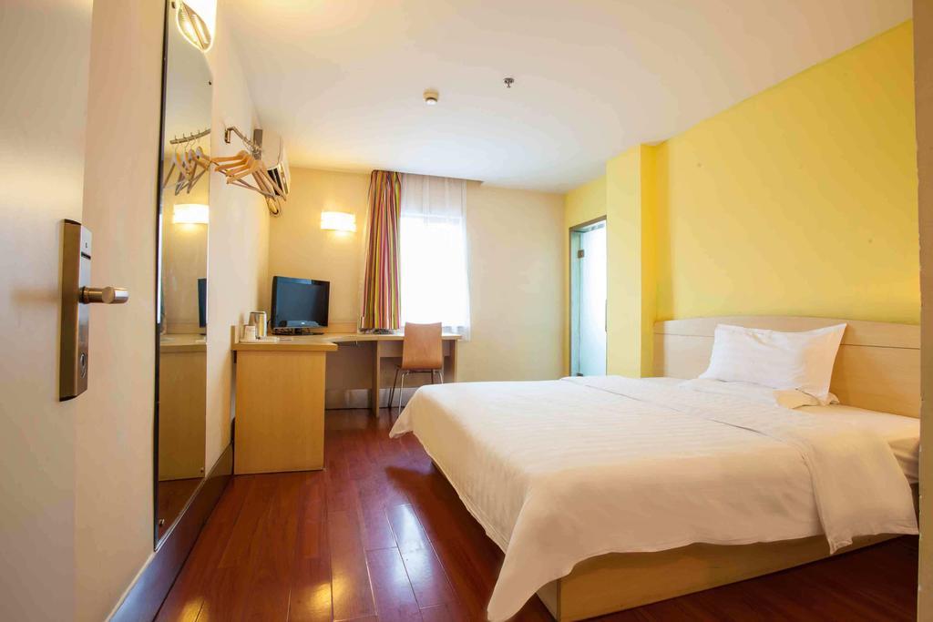 7Days Inn Guangzhou Gangding Longkou XI Road Quarto foto