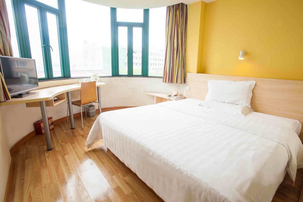7Days Inn Guangzhou Gangding Longkou XI Road Quarto foto
