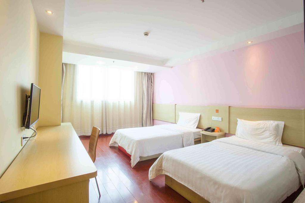 7Days Inn Guangzhou Gangding Longkou XI Road Quarto foto